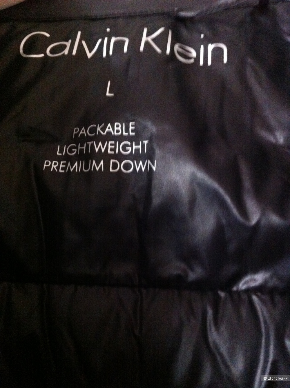Женский пуховик Calvin Klein черный маркировка L на 48-50.