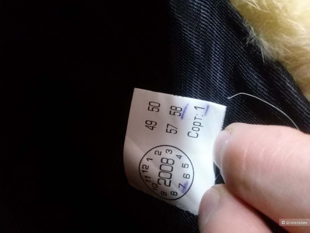 Норковая шапка бежевого цвета российской марки.