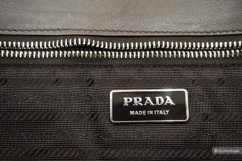 Большой клатч Prada в том состоянии, что был при покупке