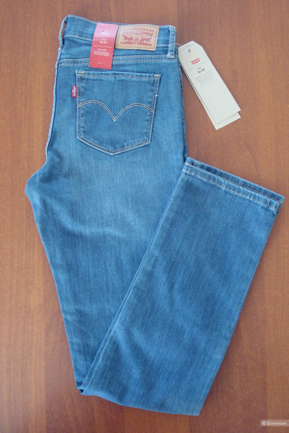 Новые джинсы Levi's 712 Slim Fit размер W27 L30 с ярлыками голубые
