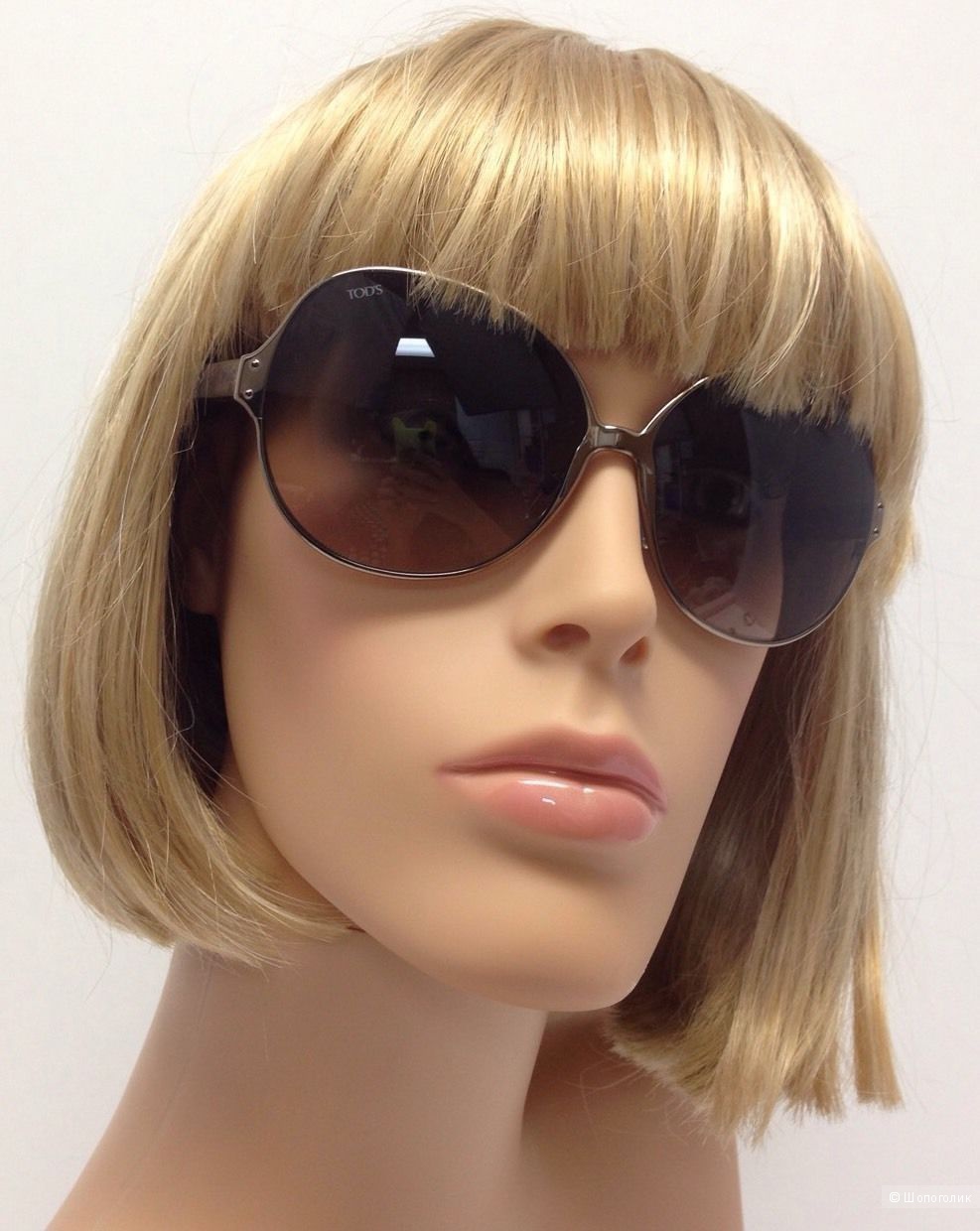 Женские солнцезащитные очки Tod's