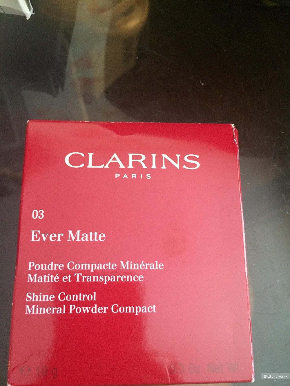 Минеральная матирующая пудра  Clarins в оттенке 03