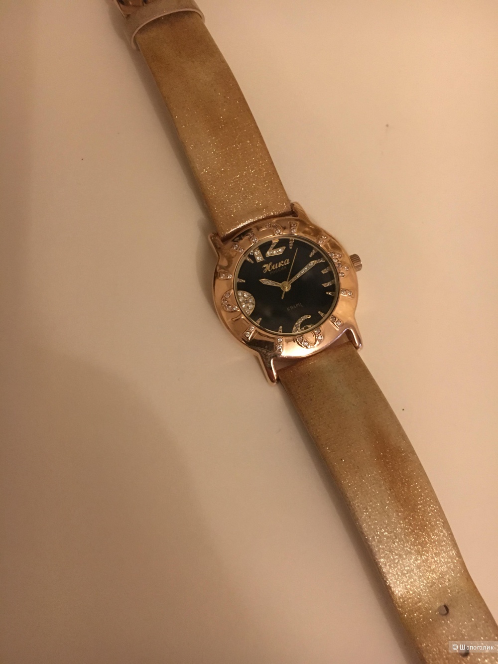 Женские золотые часы Ника, габаритные размеры 32,5 мм
