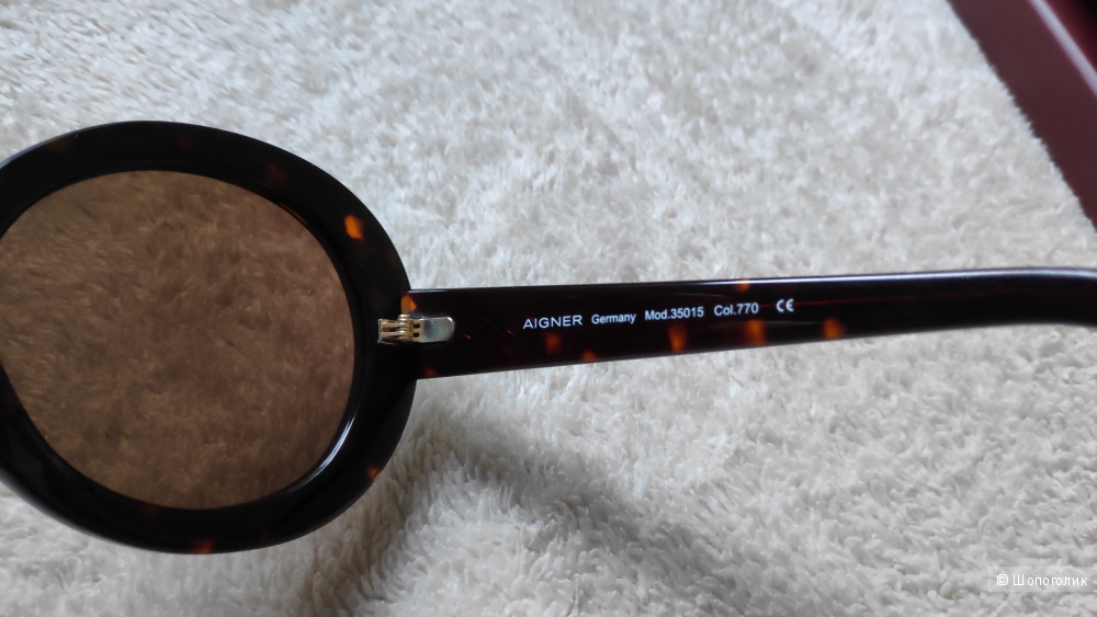Солнцезащитные очки Aigner