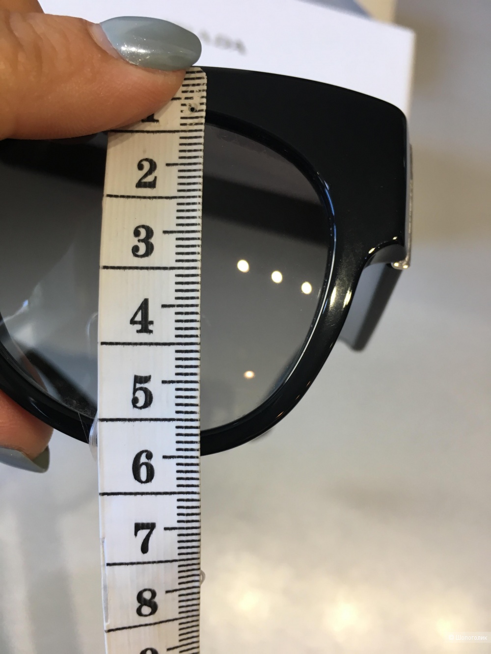 Солнцезащитные очки Prada