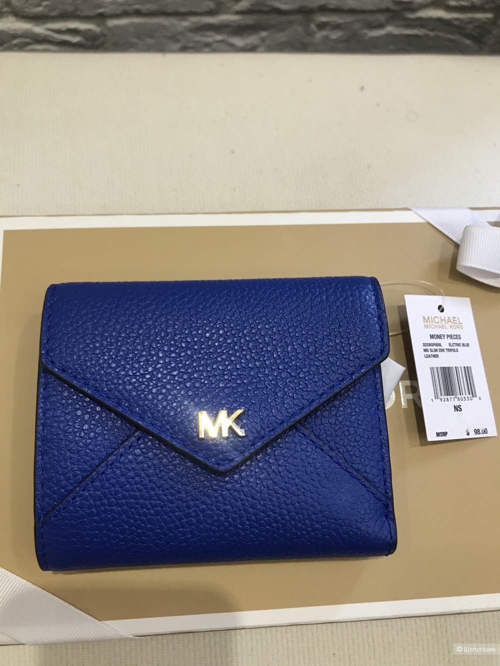 Кошелек с логотипом от Michael Kors.