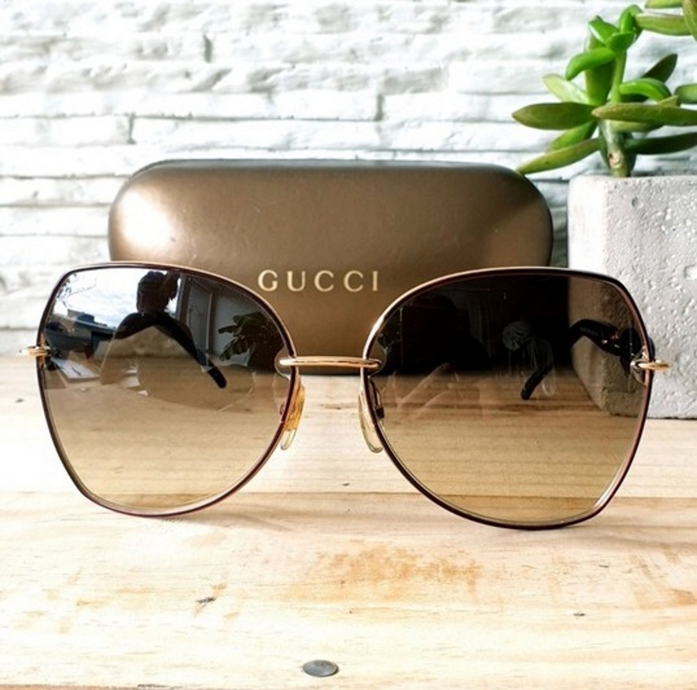Очки солнцезащитные итальянской торговой марки Gucci,