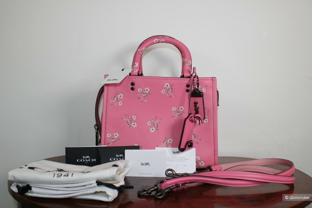 coach rogue floral bow