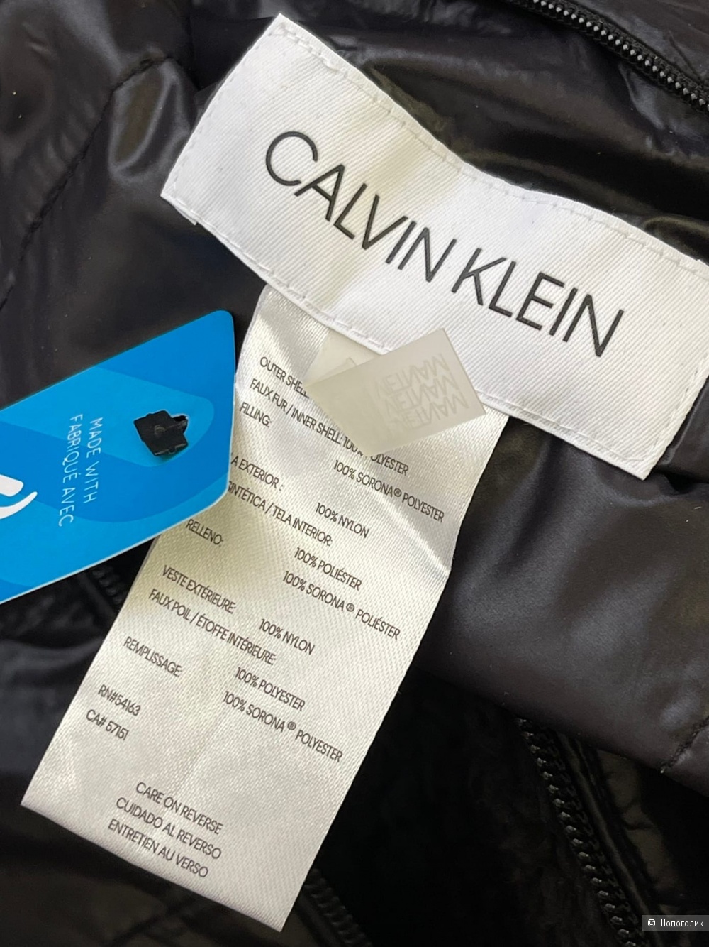 Пуховик от Calvin Klein М/L