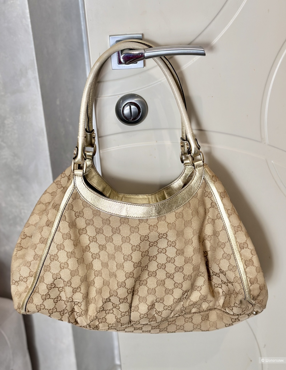 Сумка Gucci.
