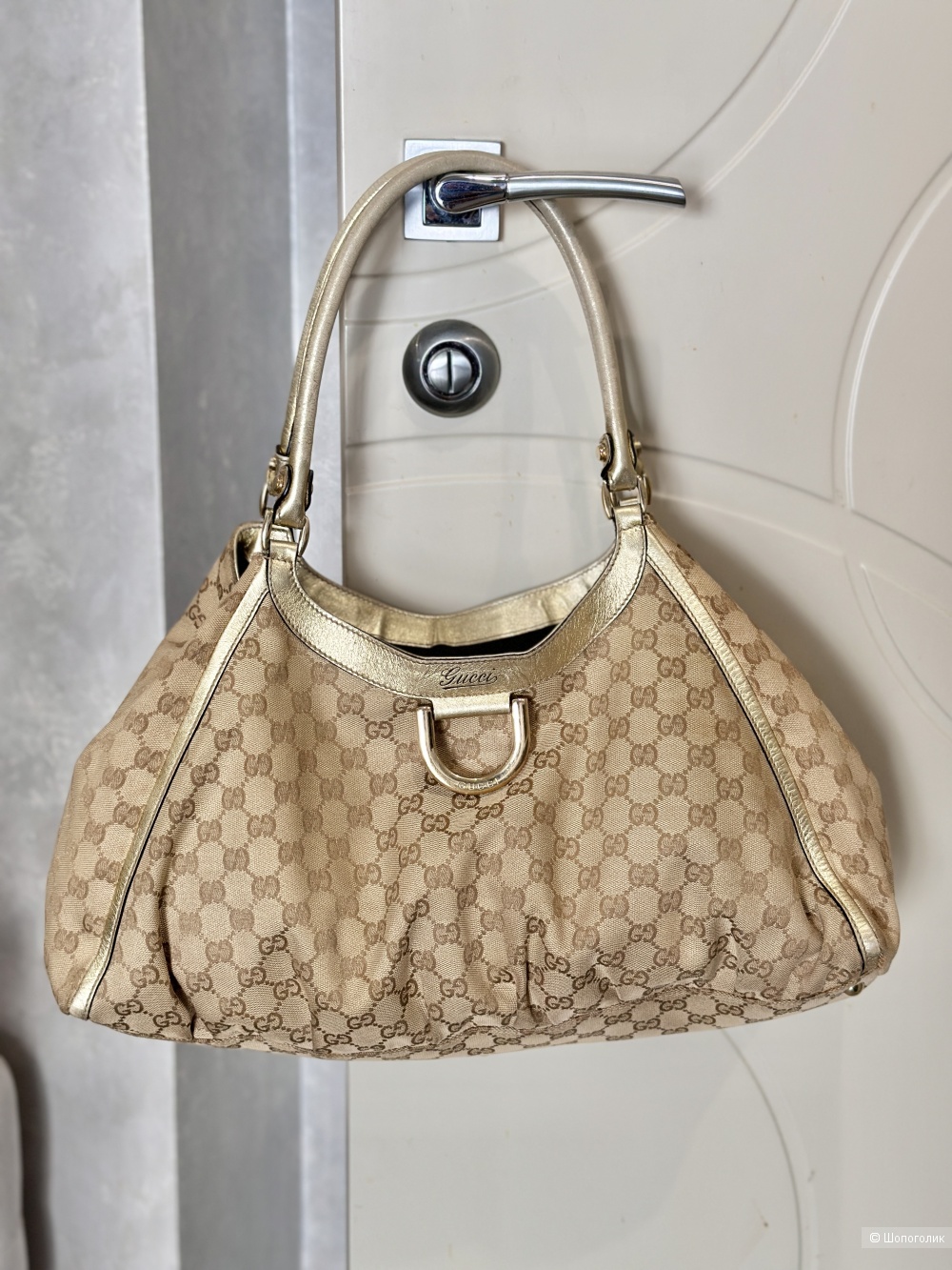 Сумка Gucci.