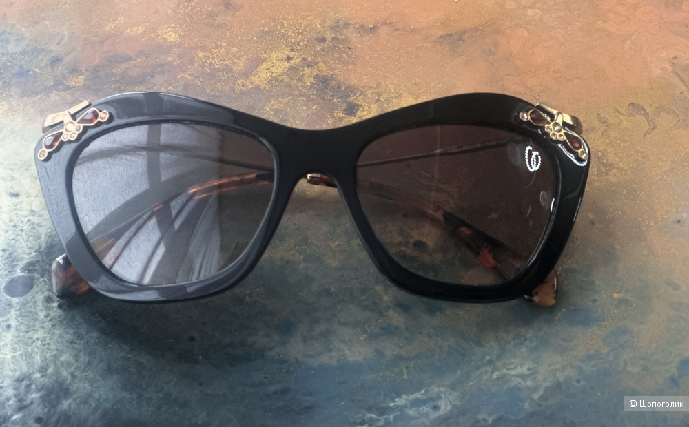 Очки Miu Miu.