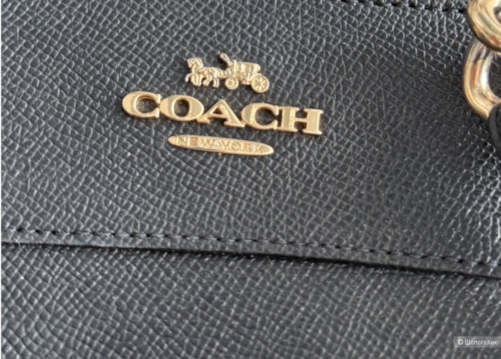 Сумка Coach.