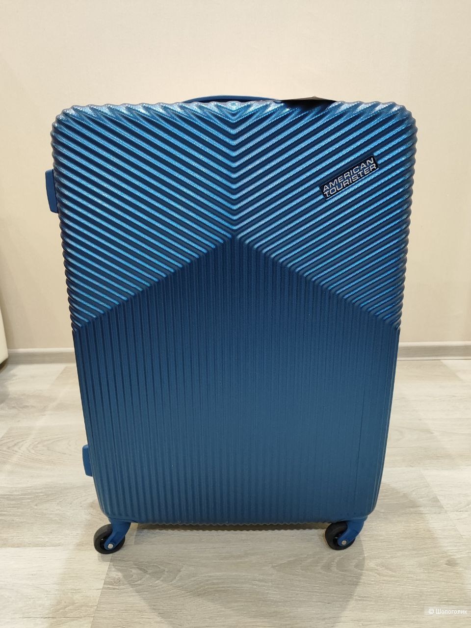 Чемодан American Tourister M и рюкзак American Tourister