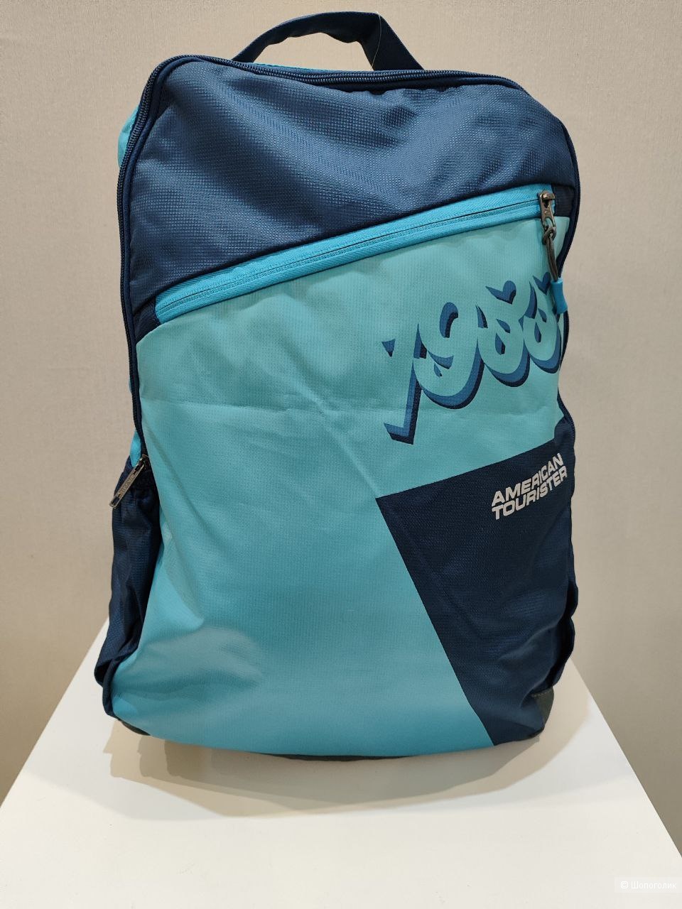 Чемодан American Tourister M и рюкзак American Tourister