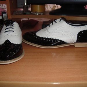 http://www.asos.com//ASOS/ASOS-MARKY-Mono-Leather-Lace-Up-Brogue/Prod/pgeproduct.aspx?iid=1572636