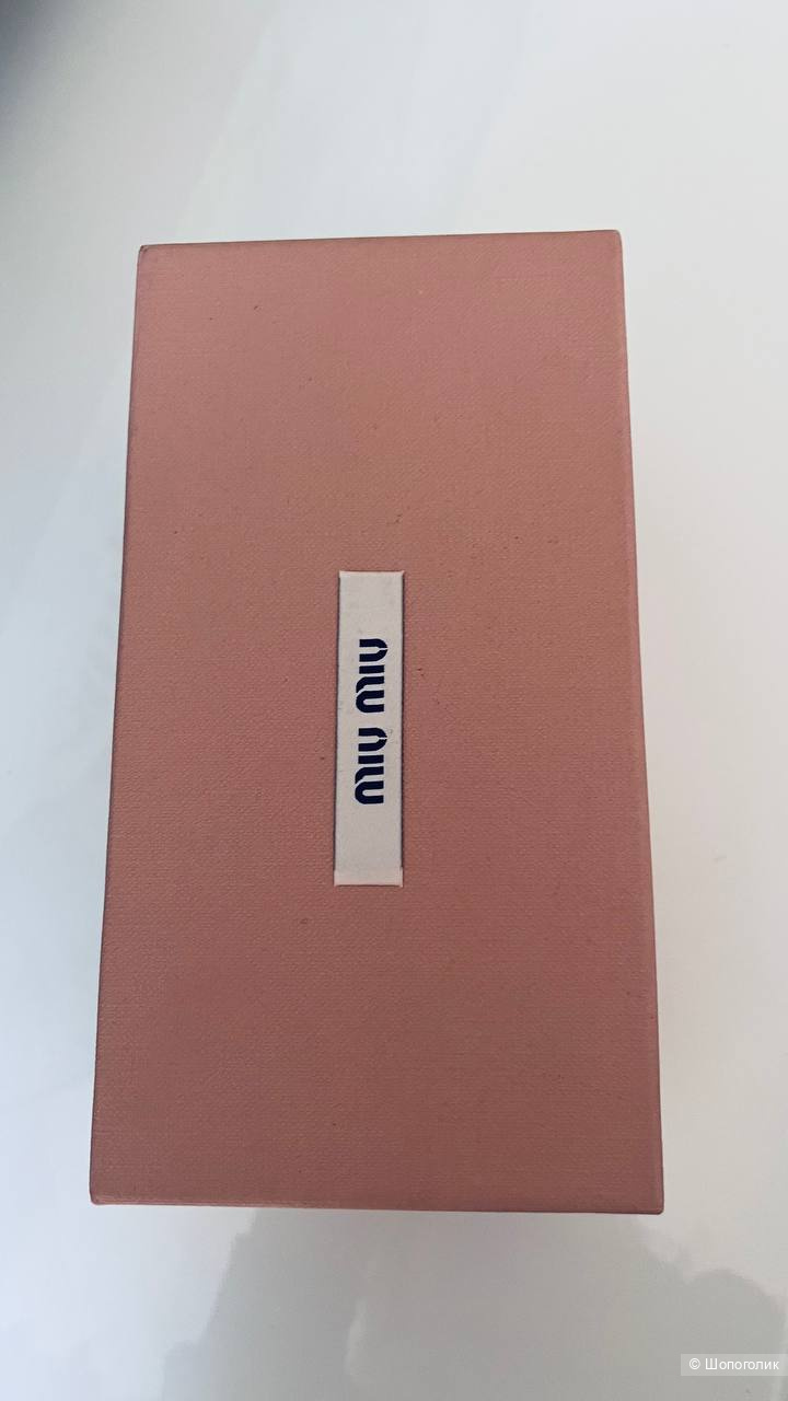 Солнцезащитные очки Miu Miu